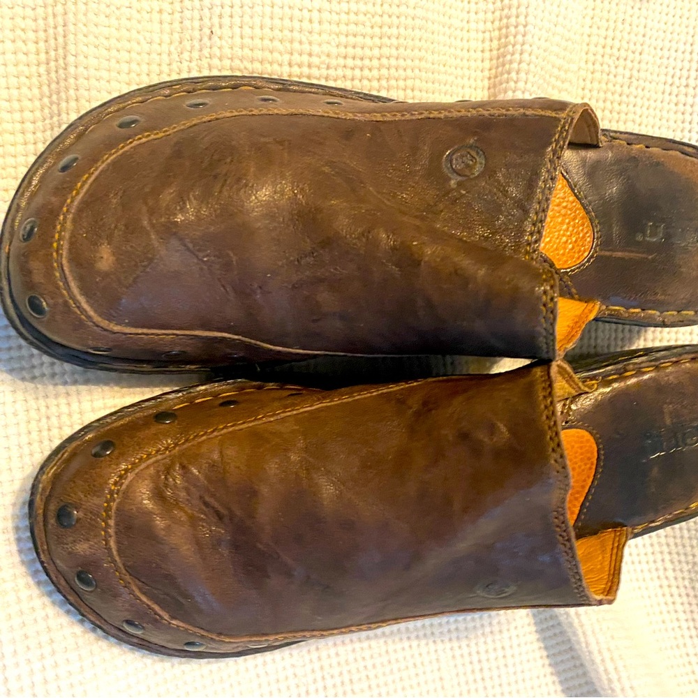 Leather, soft Rarely worn great condition slip on clogs.